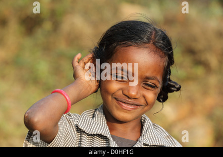 Indian girl cupping her ear to improve hearing Andhra Pradesh South India Stock Photo