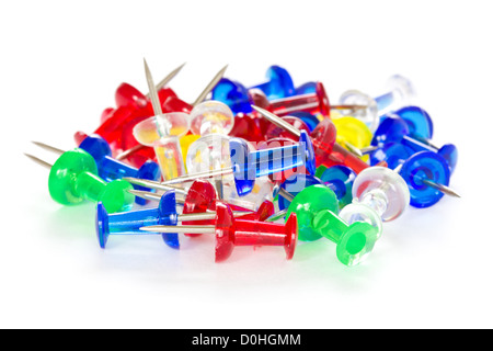 Pile of colorful pushpins on a white background Stock Photo