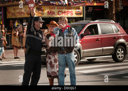 British holidaymakers during the annual fancy dress street party in ...