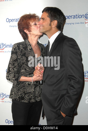 John Stamos and his mother Loretta Operation Smile's 2010 Smile Gala held at The Beverly Hilton Hotel Beverly Hills, California Stock Photo