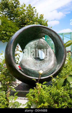 A view of Sphere with Inner Form which is one of the sculptures in the Barbara Hepworth Museum garden. Stock Photo