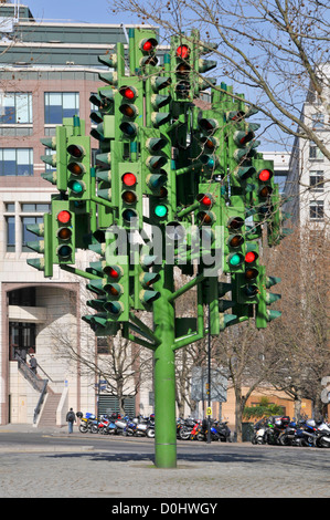 Traffic Light tree sculpture by  French sculptor Pierre Vivant containing 75 sets of lights on roundabout at Canary Wharf London Docklands England UK Stock Photo