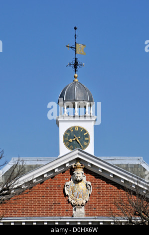 Chapel at Trinity Green Almshouses grade one listed building close up of gable end and clock tower Mile End Road Whitechapel  East London England UK Stock Photo
