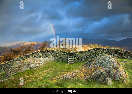 Rainbow over Black Crag near Windermere. Stock Photo