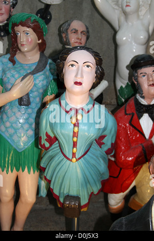 In the dry berth under Cutty Sark is the largest collection of merchant navy figureheads in the world. Stock Photo