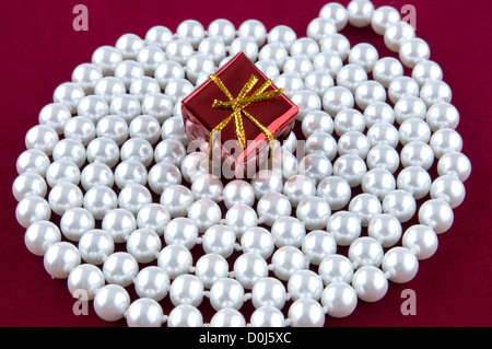 Gift box on pearl Stock Photo