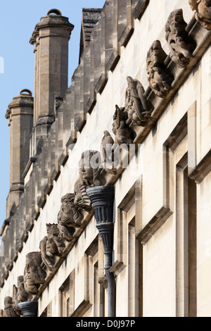 Array of gargoyles and exotics adorning the walls of Magdalen College in Oxford. Stock Photo
