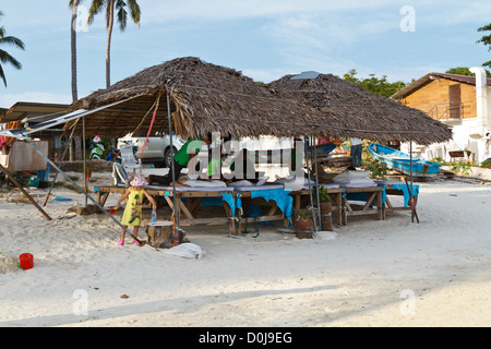 Thai Massage on Chaweng Beach on Ko Samui, Thailand Stock Photo