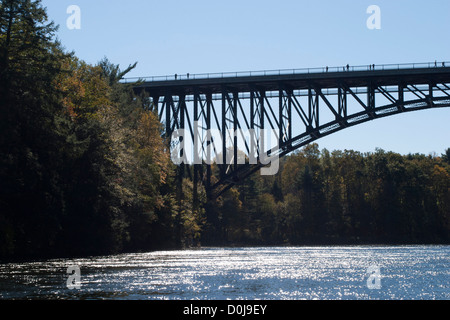 French King Bridge, a large steel-frame arch bridge built in 1931/32,  spans the Connecticut River in Northfield Massachusetts . Stock Photo