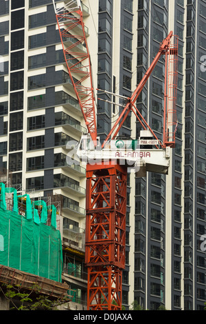 On going works with a crane on a residential real estate project in Kuala Lumpur, Malaysia Stock Photo