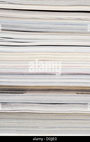 Background of a pile of old magazines closeup. Stock Photo