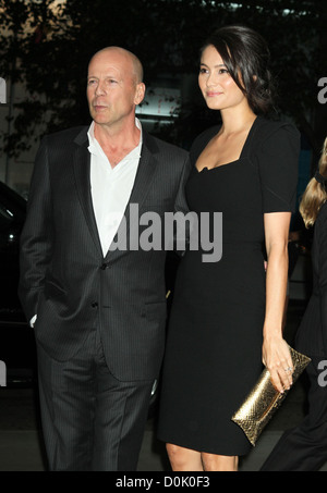 Bruce Willis and Emma Heming The Cinema Society Film Screening of 'Red' held at The Museum of Modern Art - Outside Arrivals New Stock Photo