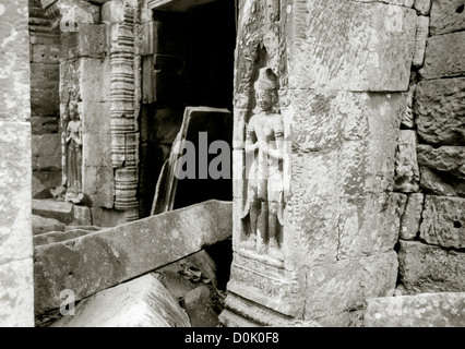 Travel Photography - The Temple of Ta Prohm at The Temples of Angkor in Cambodia in Indochina in Southeast Asia Far East. Sculpture Art Stock Photo