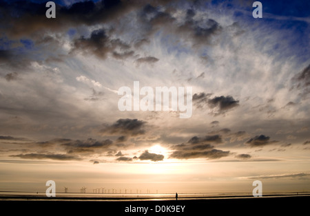 Anthony Gormley's Another Place sculpture on Crosby Beach near Liverpool. Stock Photo