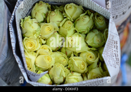 A bunch of roses for sale at a Bangkok flower market. Stock Photo