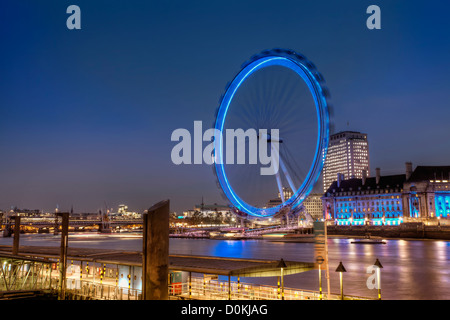 A view of the London Eye at night. Stock Photo
