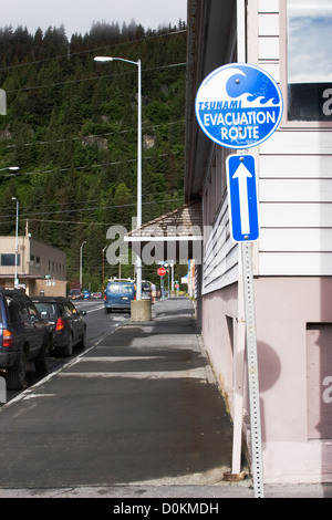 A sign and evacuation route should a Tsunami occur and hit downtown Seward, Alaska. Stock Photo