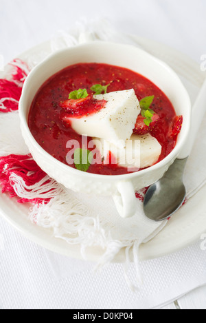 Strawberry soup and fresh cheese Stock Photo