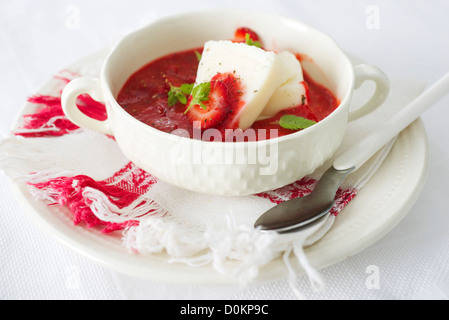 Strawberry soup and fresh cheese Stock Photo