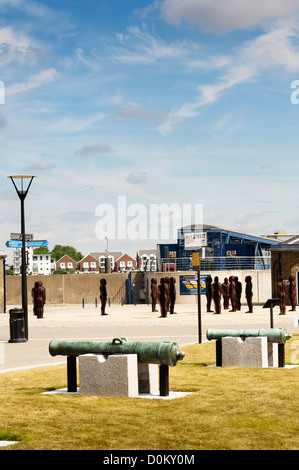 A display of cannons at Royal Arsenal Riverside with the Assembly Edition 1 installation by Peter Burke in the background. Stock Photo
