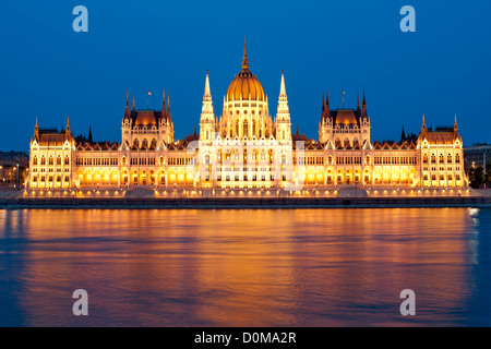 Dusk view of the Hungarian Parliament Building on the banks of the Danube River in Budapest, the capital of Hungary. Stock Photo