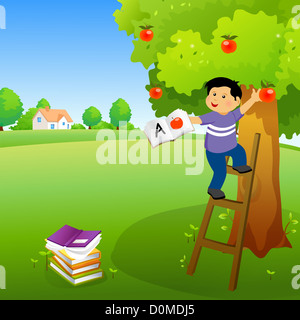 Boy holding a book and climbing an apple tree Stock Photo