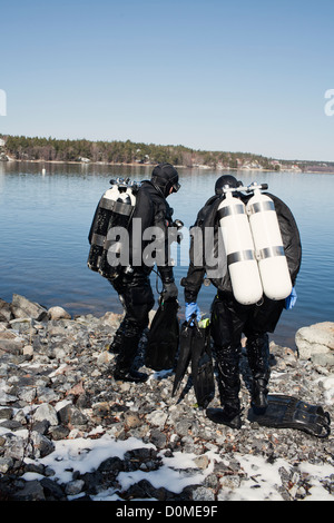 Two men preparing for diving Stock Photo