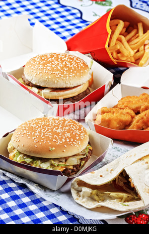Fastfood on tablecloth Stock Photo