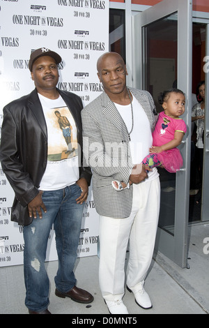 Reggie Bythewood , Mike Tyson and daughter Milan Tyson at the screening of ' One Night in Vegas ' held at The Dwyer Cultural Stock Photo