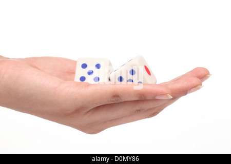Dices in the hand on white background Stock Photo