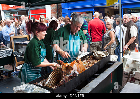 Carving pig roast, Abergavenny Food Festival, Wales, UK Stock Photo