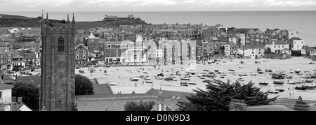 Black and White panoramic image Summer Seafront, harbour and beach view, St Ives town, St Ives Bay, Cornwall County; England; UK Stock Photo