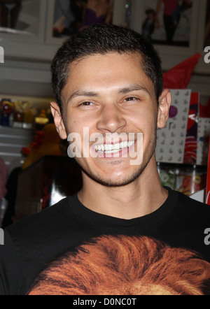 Alex Meraz The Twilight Wolf Pack bite into something sweet at Sugar Factory at Miracle Mile shops at Planet Hollywood Resort Stock Photo