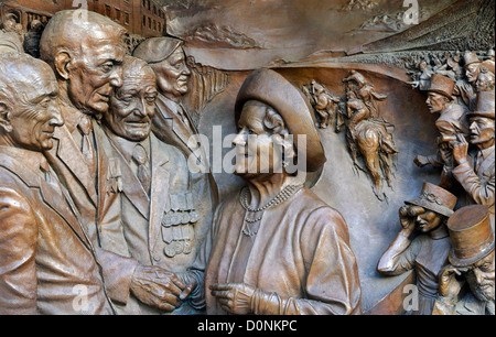 Bronze frieze showing scenes from the life of Queen Elizabeth the Queen Mother  by Paul Day on the Queen Mother Memorial Stock Photo