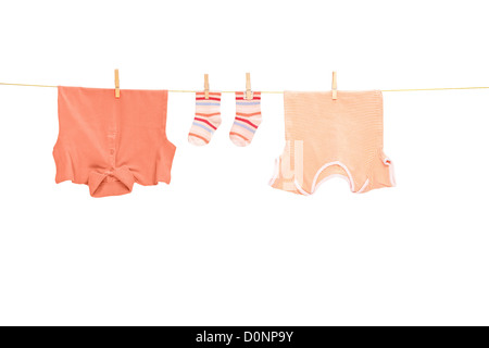 Laundry line with clothes isolated on white background Stock Photo