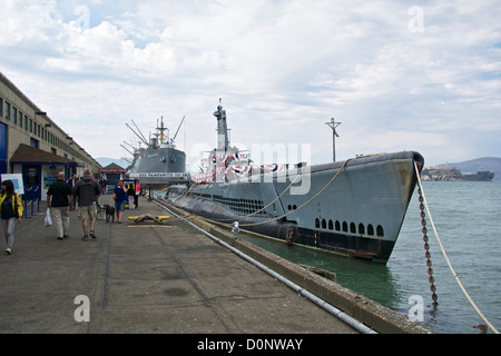 WWII era submarine USS Pampanito with liberty ship Jeremiah O'Brien in background. San Francisco California Stock Photo