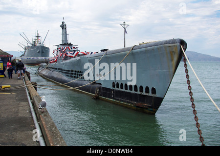 WWII era submarine USS Pampanito with liberty ship Jeremiah O'Brien in background. San Francisco California Stock Photo