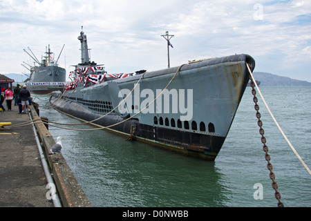 WWII era submarine USS Pampanito with liberty ship Jeremiah O'Brien in background. San Francisco California Stock Photo