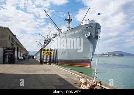 Liberty ship Jeremiah O'Brien, museum ship. San Francisco, California. Alcatraz Island at right. Stock Photo