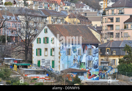 House covered in graffiti, Neuchatel, Switzerland Stock Photo