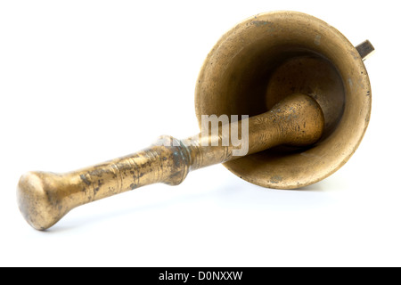 Brass mortar with a pestle isolated Stock Photo