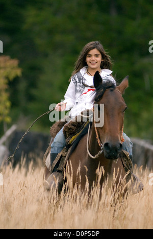 Girl riding a horse in Chile's Futaleufu River Valley.  Stock Photo