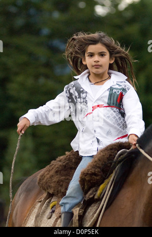 Girl riding a horse in Chile's Futaleufu River Valley.  Stock Photo