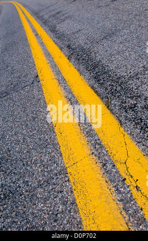 yellow dividing lines on the highway Stock Photo