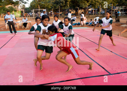 Girls playing kabaddi in nehru stadium near coimbatore,tamil nadu,india Stock Photo