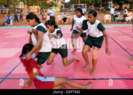 Girls playing kabaddi in nehru stadium near coimbatore,tamil nadu,india Stock Photo