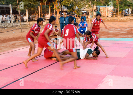 Girls playing kabaddi in nehru stadium near coimbatore,tamil nadu,india Stock Photo