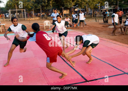 Girls playing kabaddi in nehru stadium near coimbatore,tamil nadu,india Stock Photo