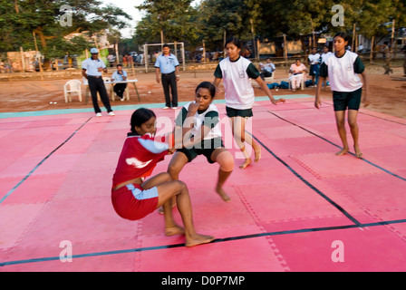 Girls playing kabaddi in nehru stadium near coimbatore,tamil nadu,india Stock Photo