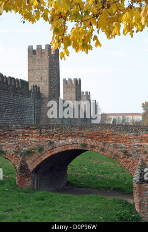 evocative bridge of an ancient medieval castle in autumn Stock Photo